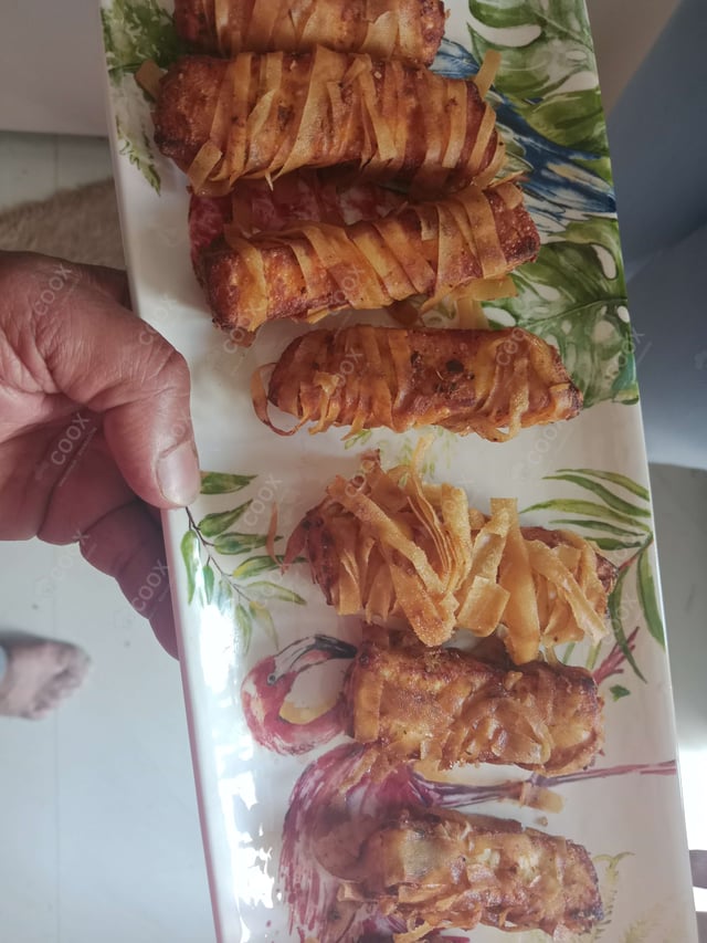 Delicious Threaded Paneer  prepared by COOX
